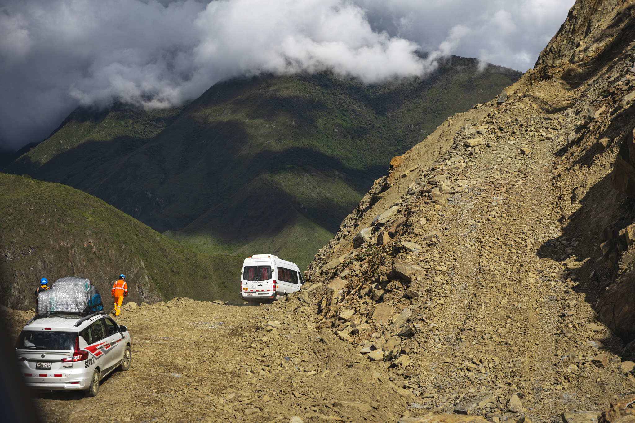 A commuter van, finally driving on the cleared road