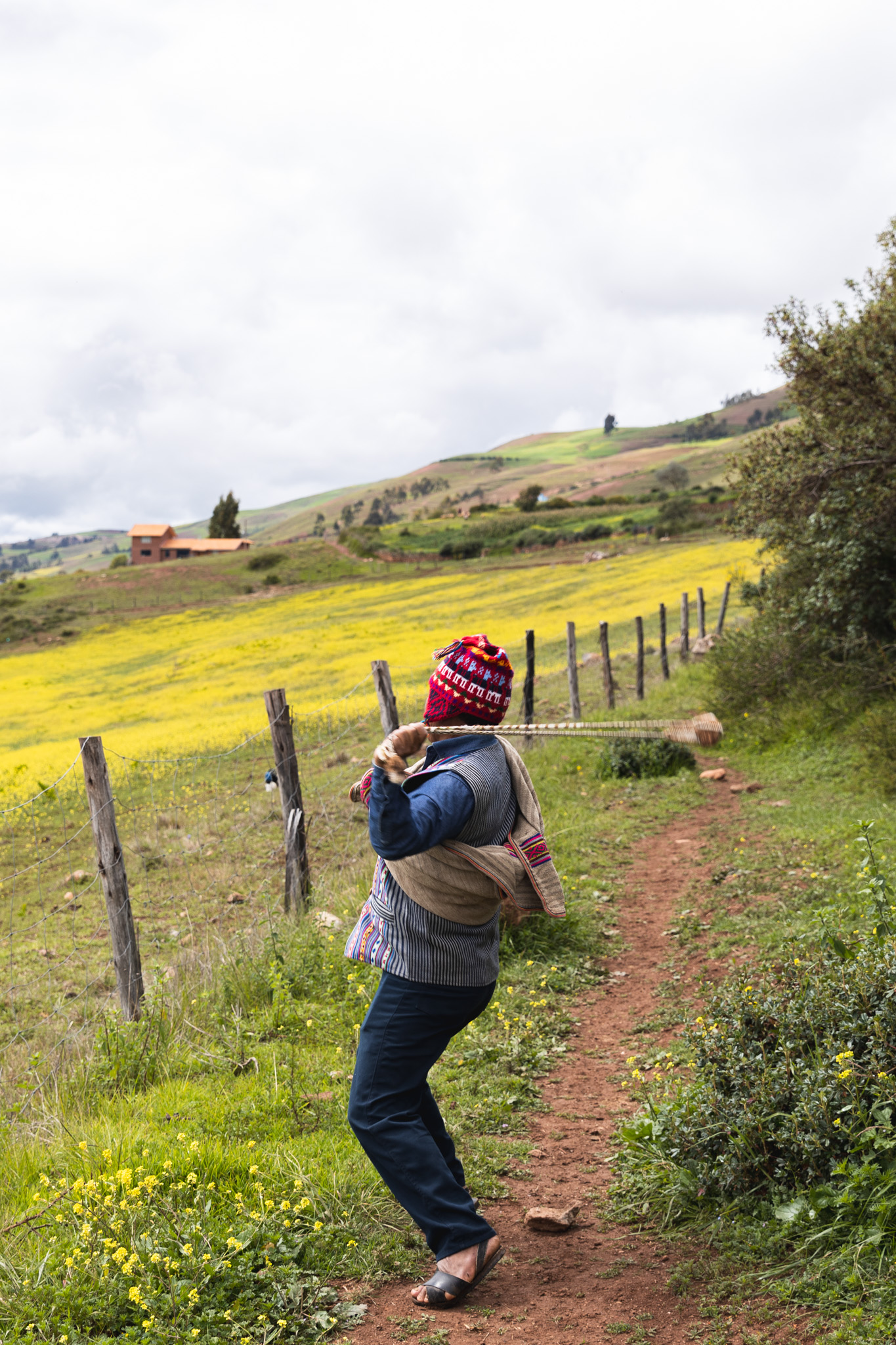 Efrain demonstrating how to use a slingshot