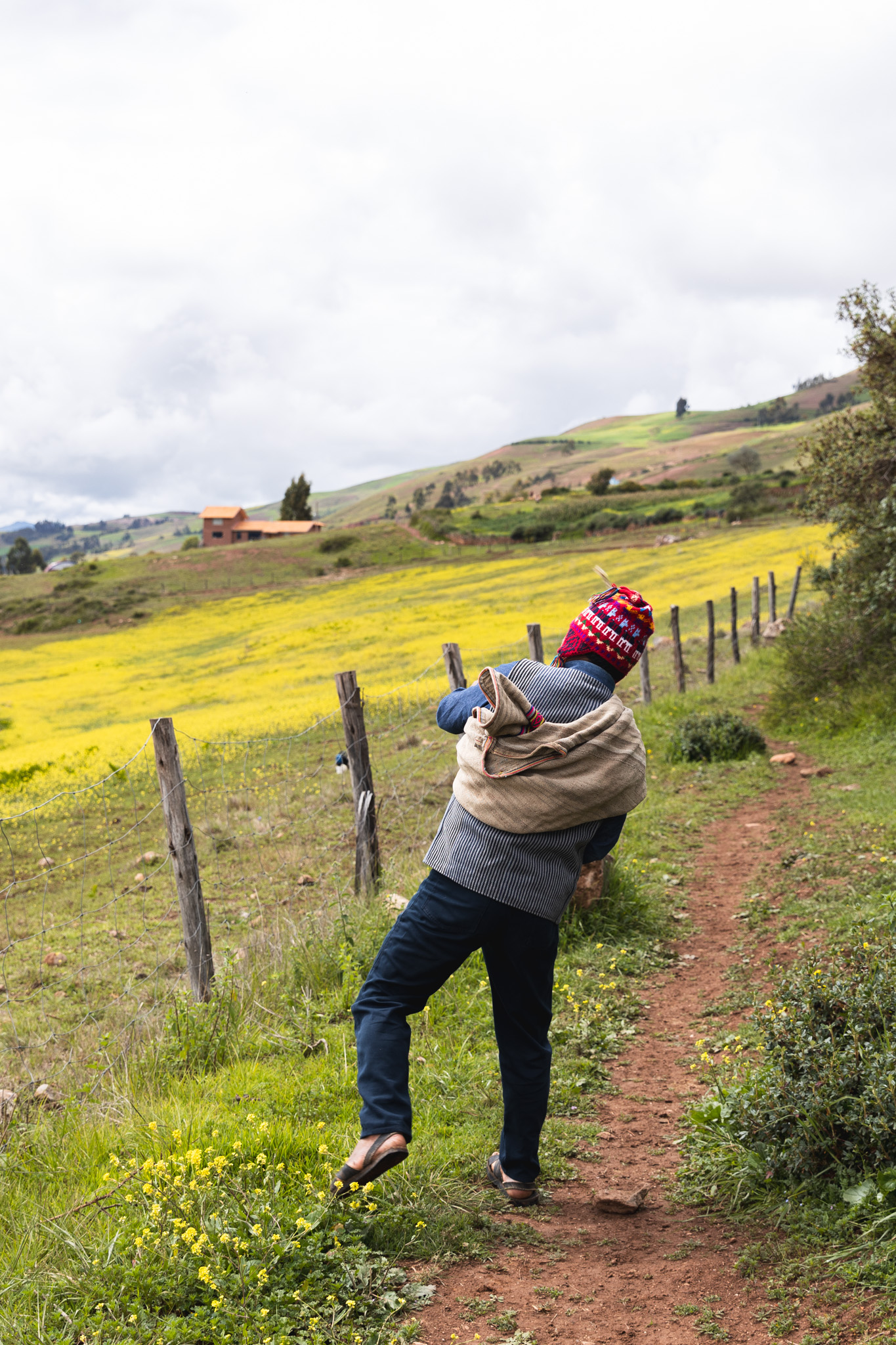 Efrain demonstrating how to use a slingshot