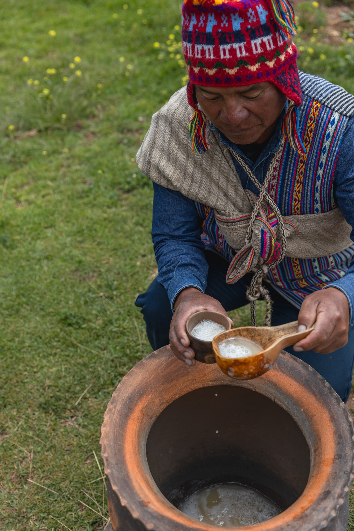 Efrain offers us chicha de jora