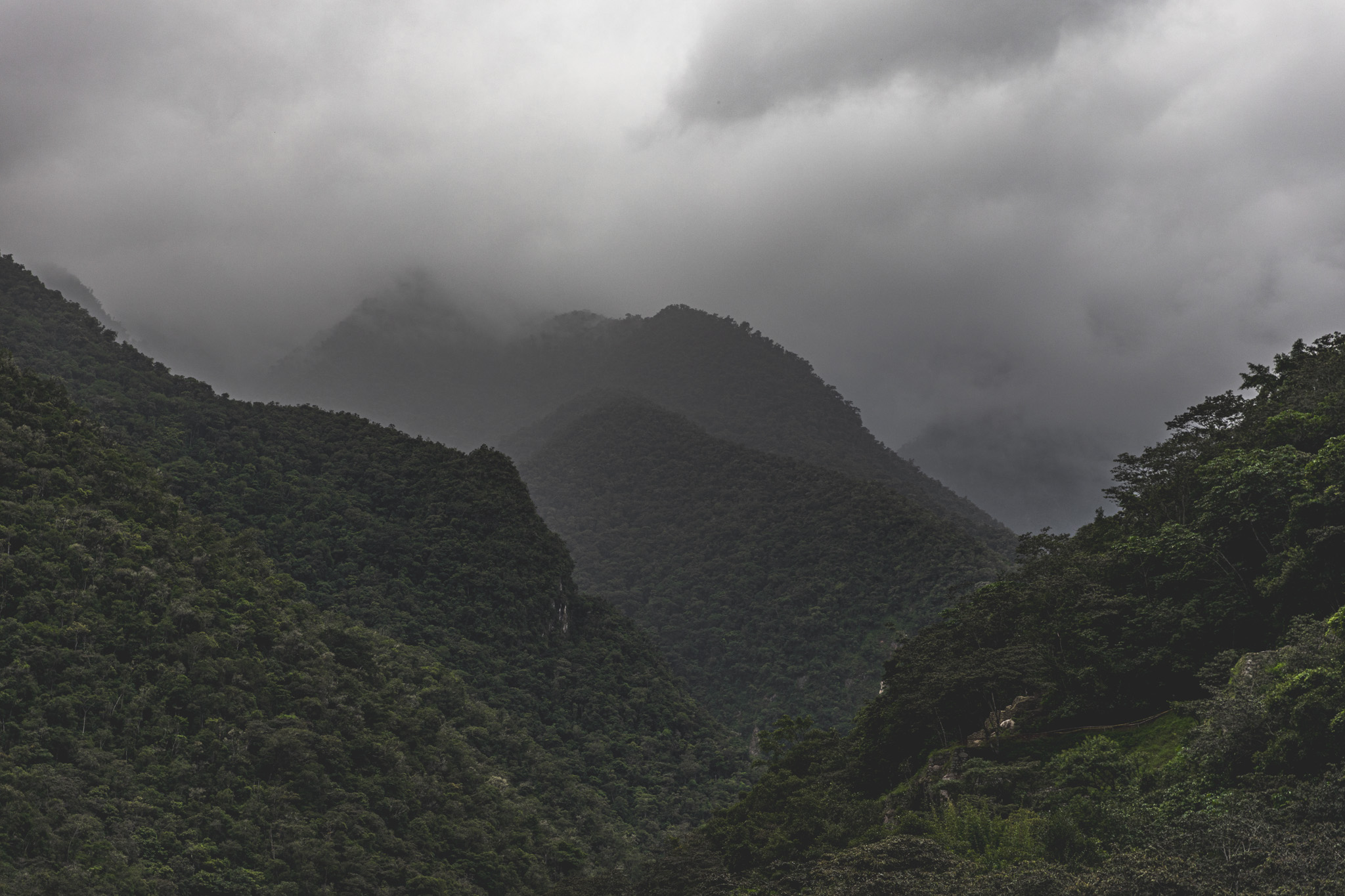 Mountains in the distance, disappearing into clouds